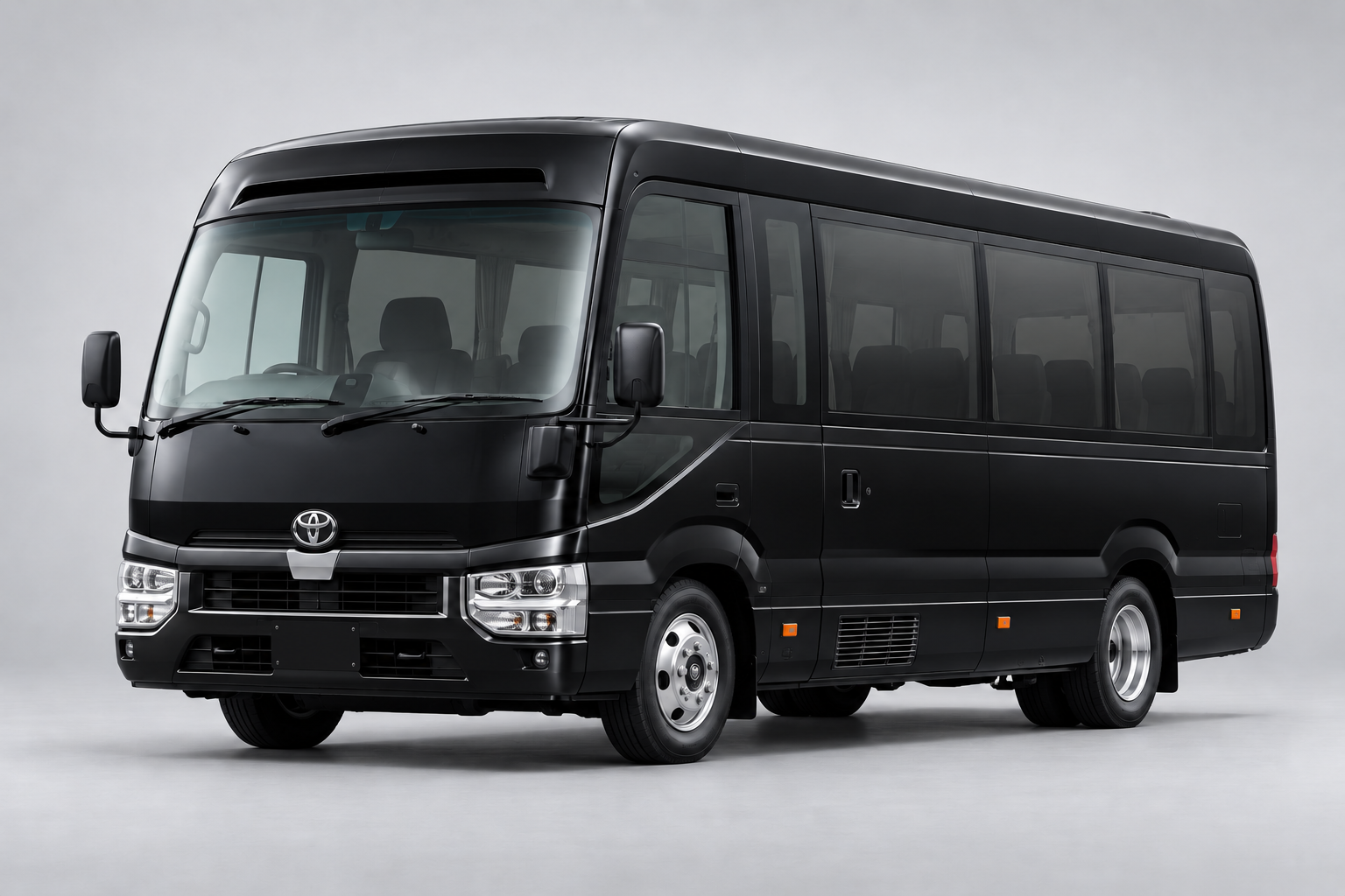 TOYOTA COASTER in black, illustrative exterior image